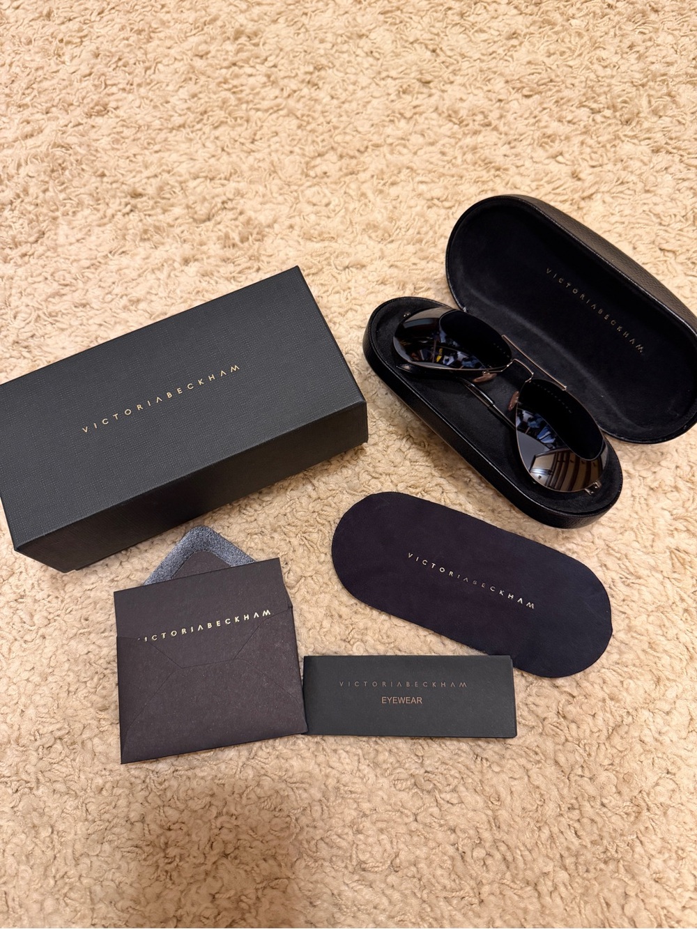 Victoria Beckham Black Sunglasses with Dark Lenses